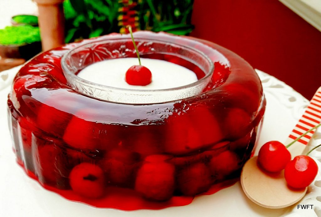 Yummy Cherry Jelly with Sweetened Cream