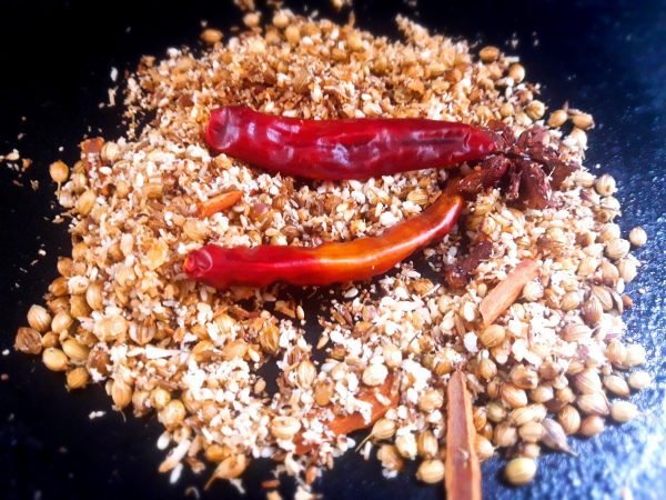 Firstly, on a tawa dry roast all the spices for masala on low flame for 2 minutes.
Blend to a fine powder and your Kolhapuri masala is ready. Keep aside.
