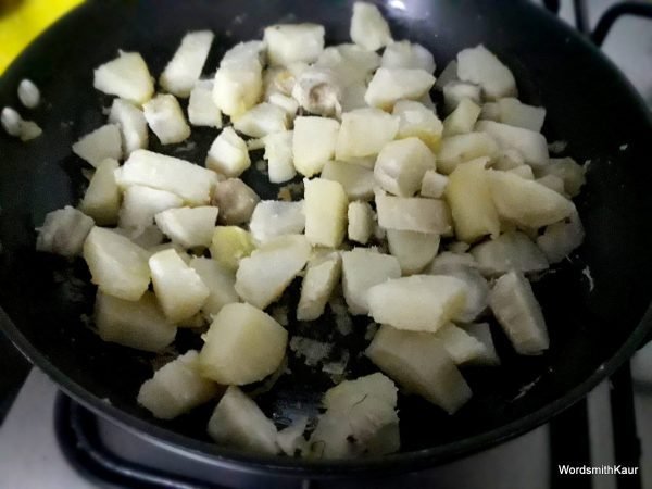 Heat oil in a pan and fry the sweet potato chunks. Fry them till light golden brown.