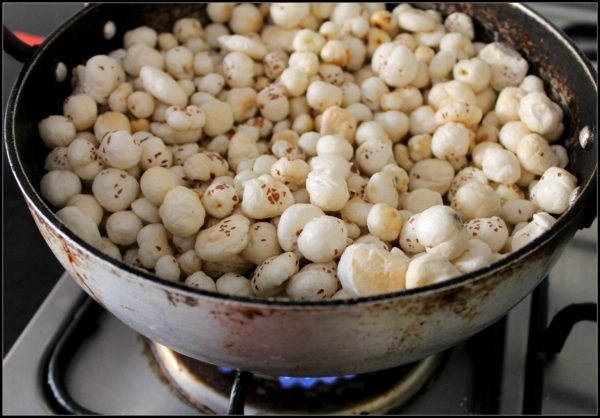 Heat the ghee in a wok and add the Makhana.