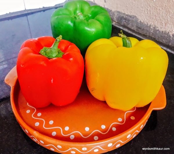 Take the peppers and wash nicely. Now carefully remove the stalk on the top.