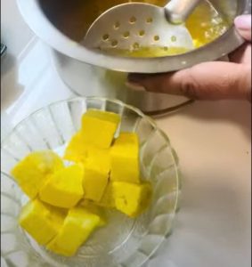 Paneer in turmeric water